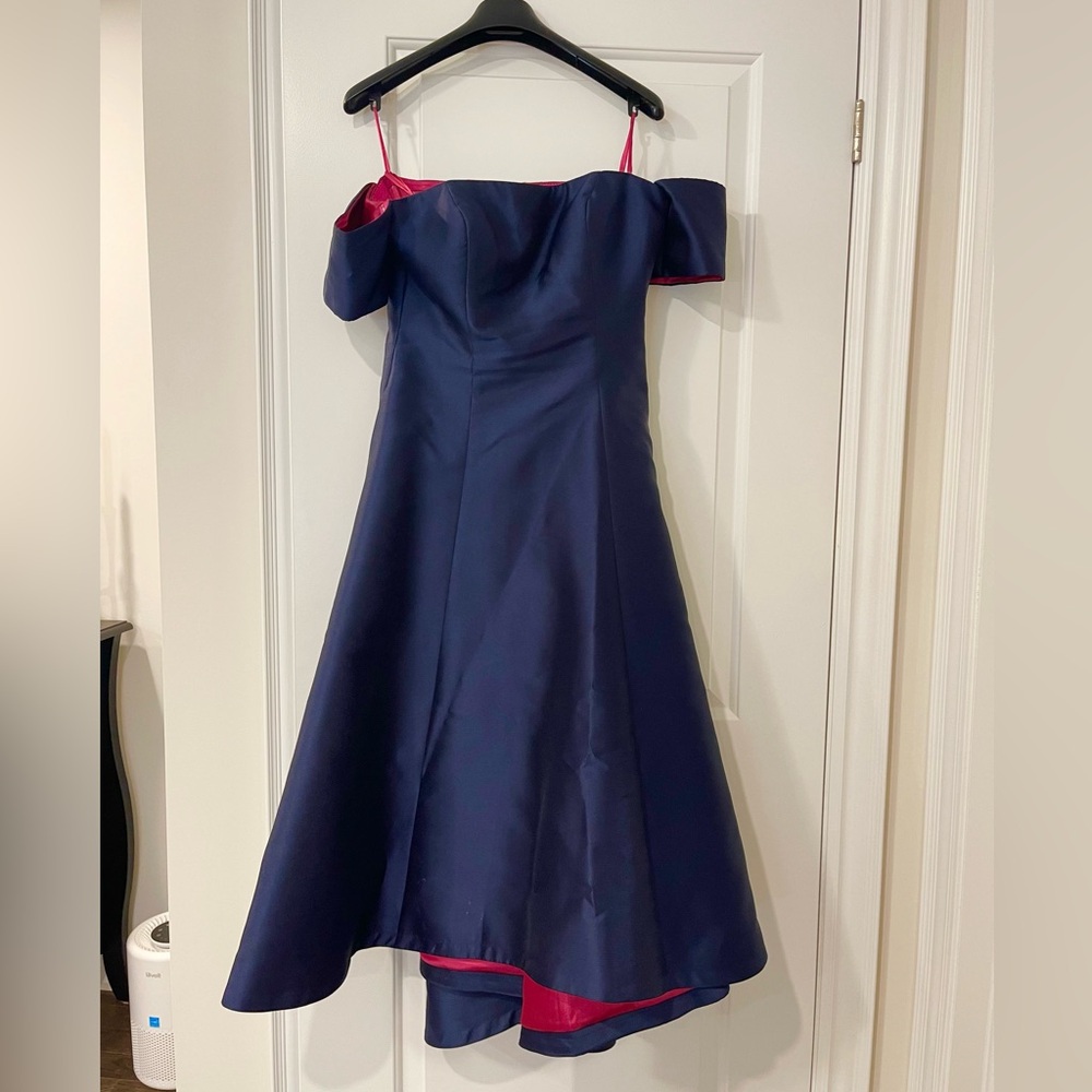 Gorgeous dark blue gown with fuchsia silk lining. Worn only once